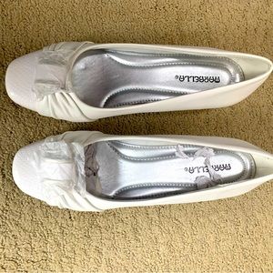 New with coverage white low heels